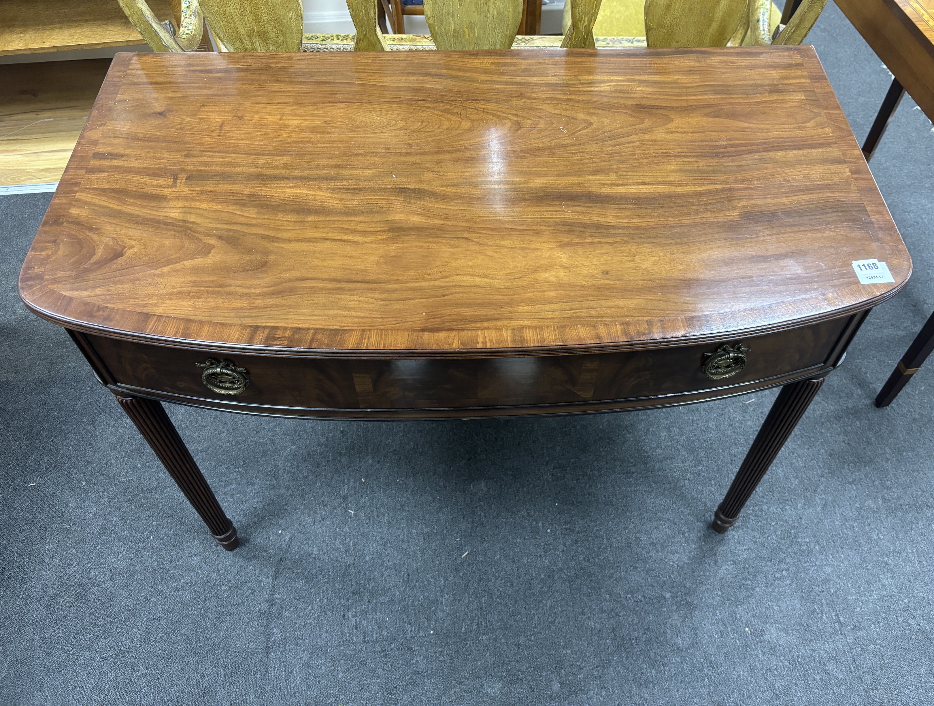 A Victorian and later mahogany bowfront side table, width 107cm, depth 57cm, height 83cm